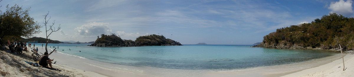 A panoramic image of people relaxing at Trunk Bay, St. John